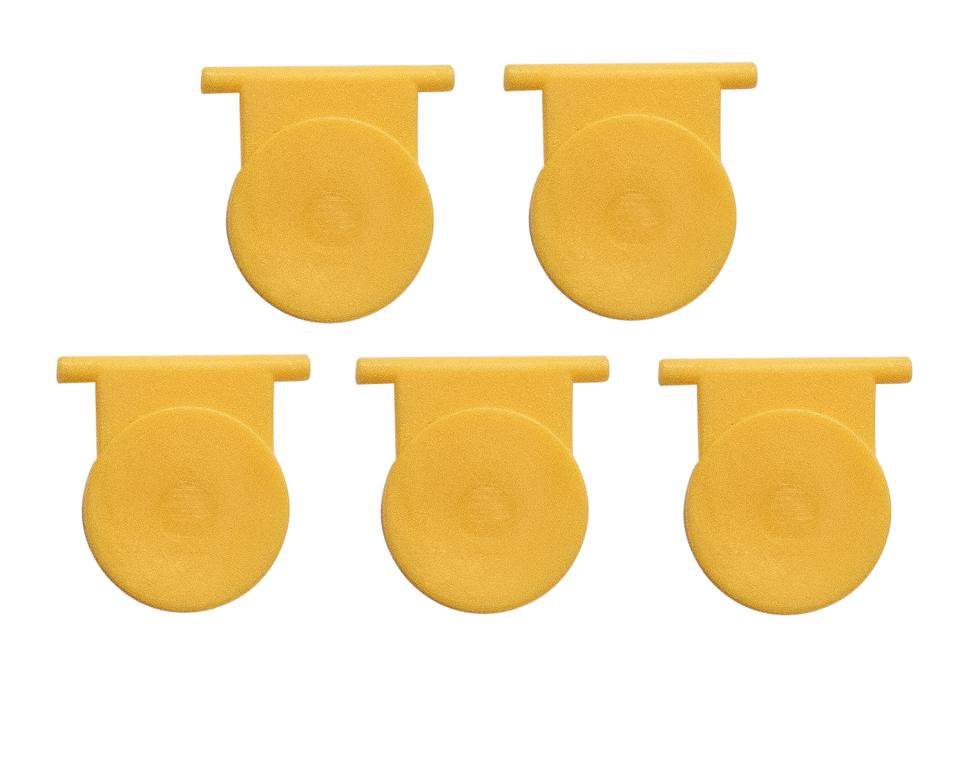 Fünf gelbe Kunststoffventilklappen mit rundem Hauptteil, rechteckiger Erweiterung und Stäbchen als Abschluss, angeordnet zwei in der oberen Reihe, zwei in der unteren, Draufsicht